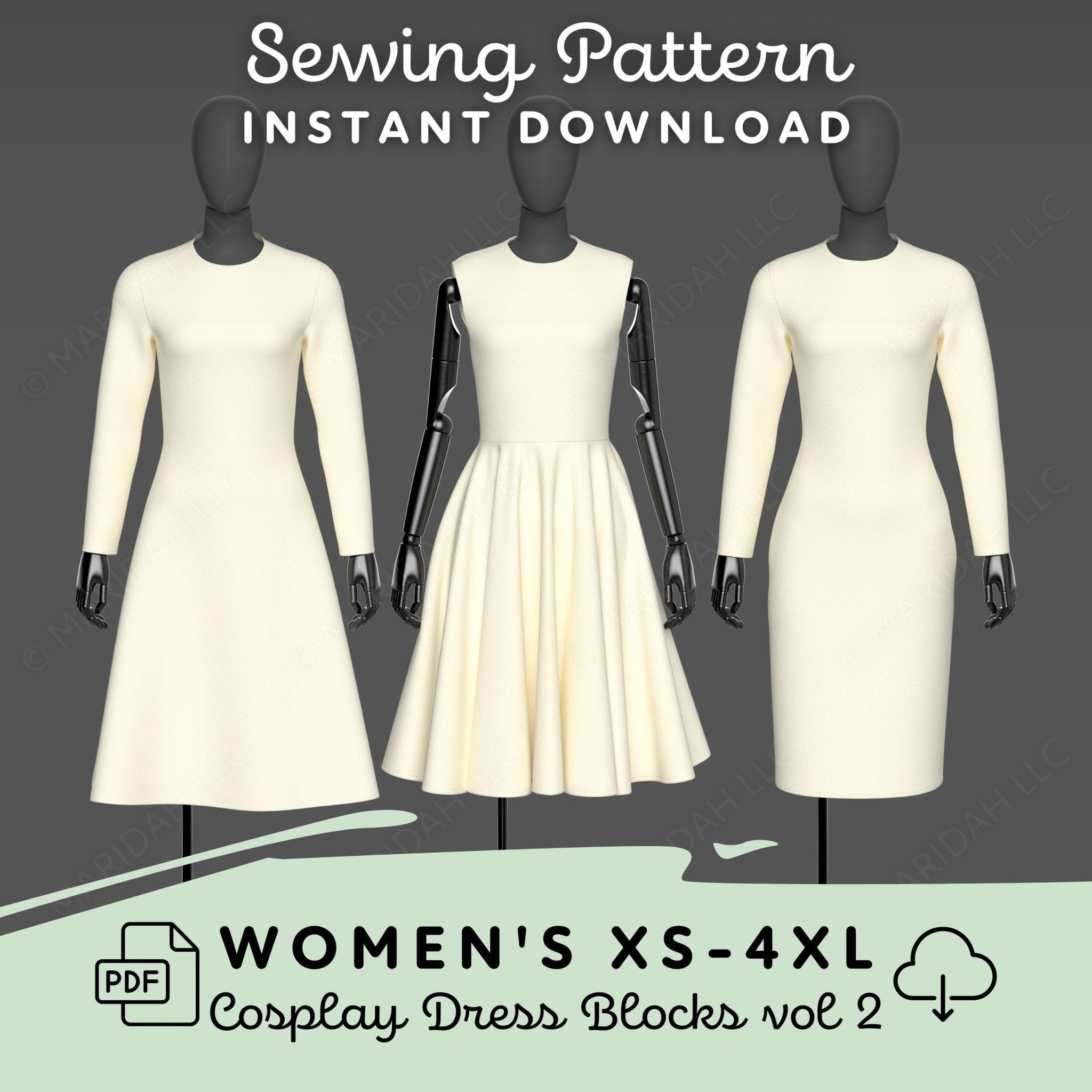 three mannequins in white dresses with black accents